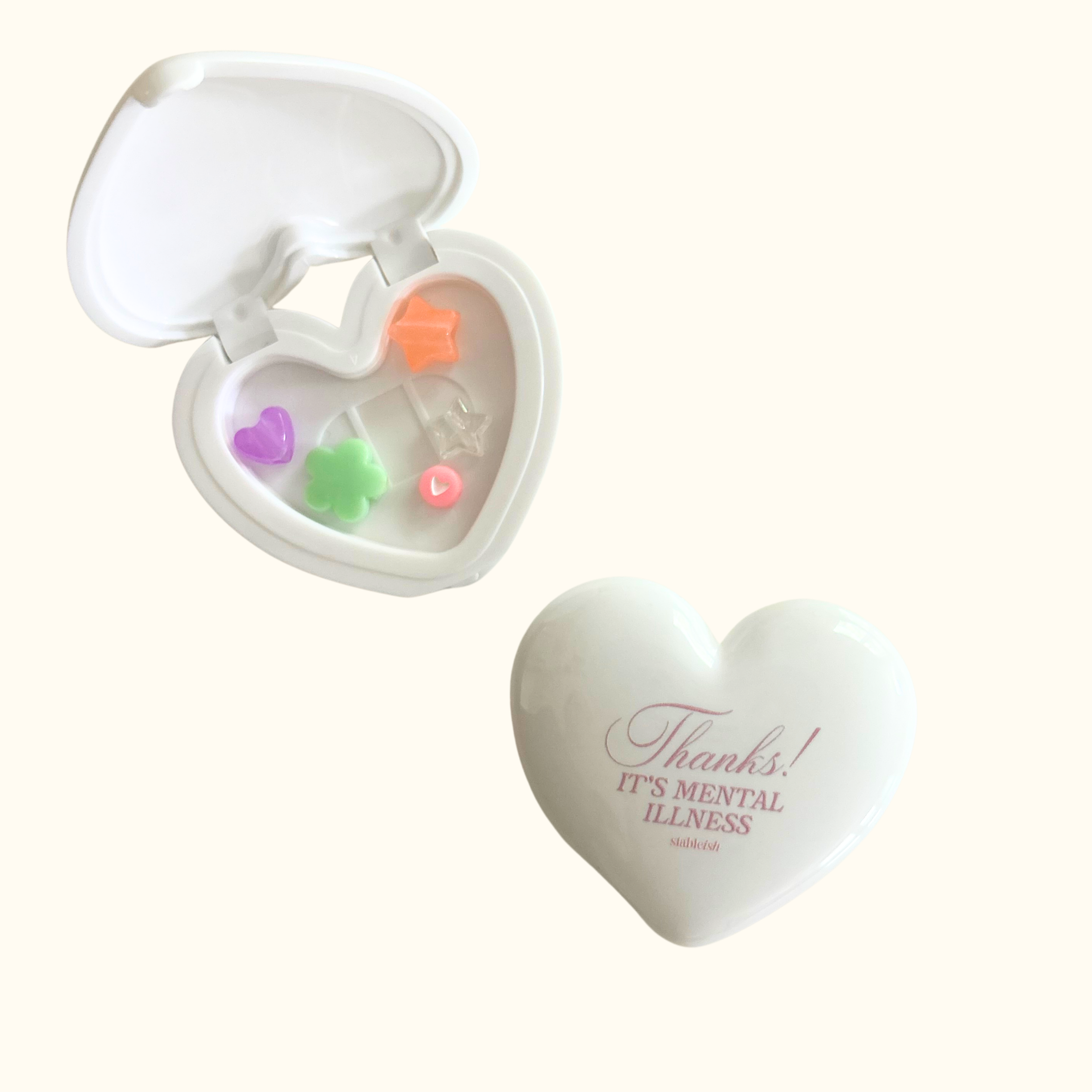 Thanks! It's Mental Illness Heart Pill Case, White & Pink